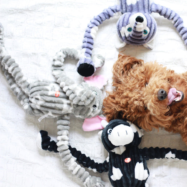 Patchwork Pet Tug Elephant Plush Dog Toy with Goldendoodle Dog